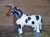 Vache en bois, noire et blanche, yeux de verre