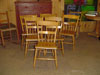 Ensemble de six chaises québécoises en bois à dos courbé.